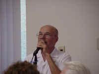 Roger at the Microphone.JPG (138299 bytes)